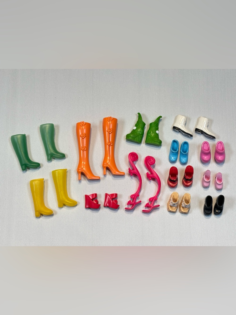 Set of Barbie doll shoes and boots